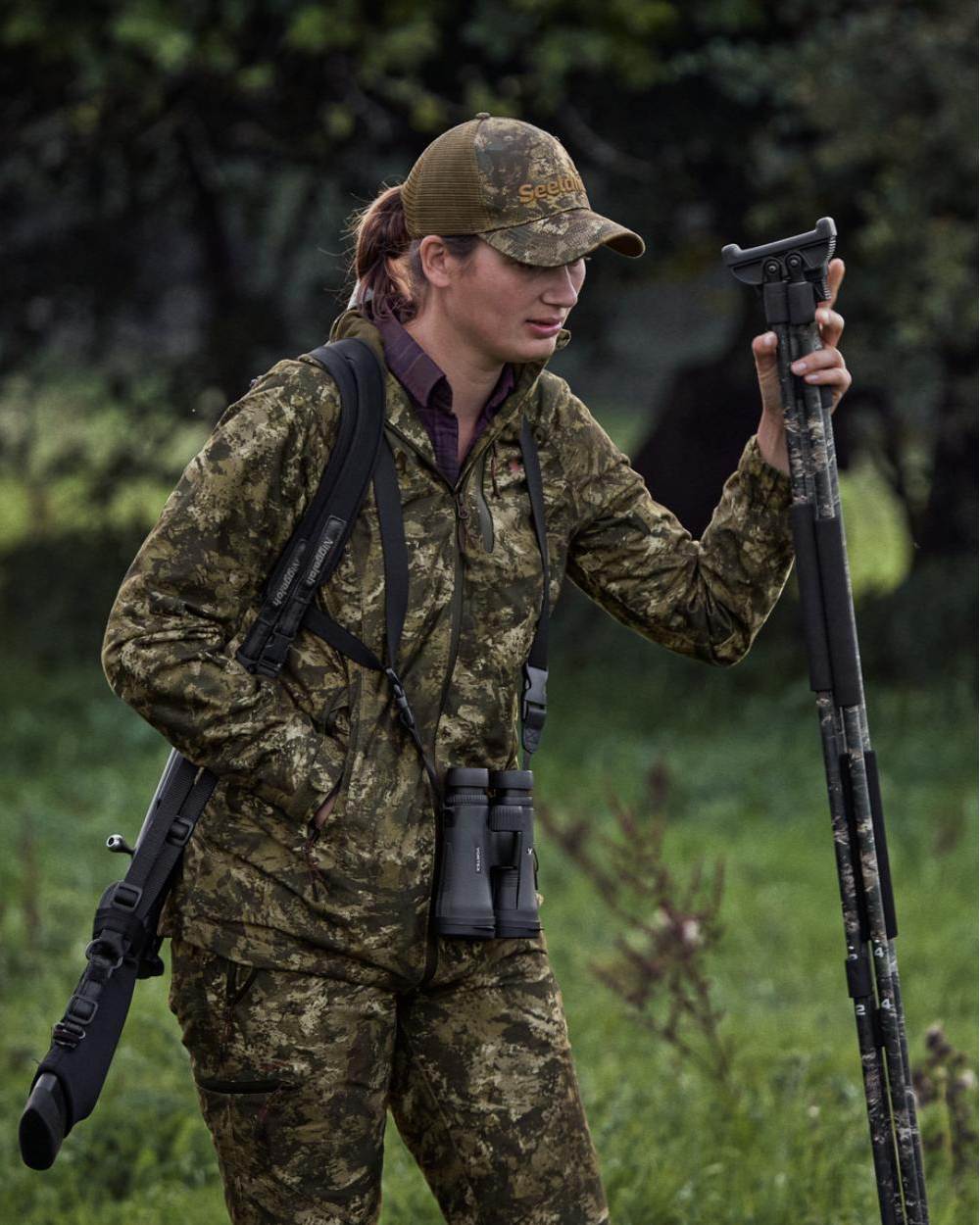 InVis MPC Green Coloured Seeland Womens Avail Camo Jacket on forest background 