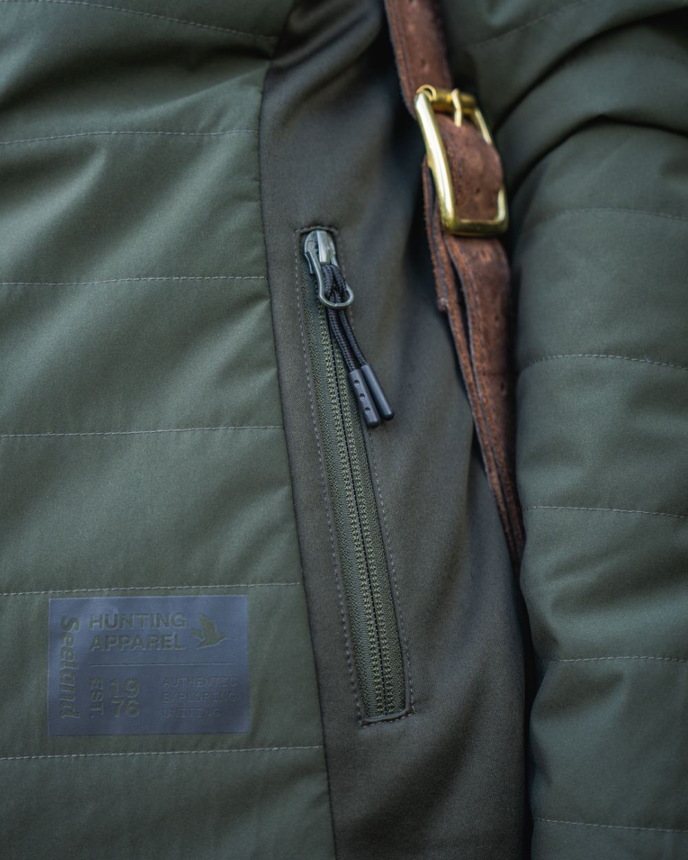 Pine Green Coloured Seeland Womens Celsius Aia Heat Jacket on outdoor background 