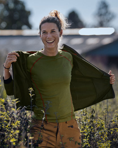 Capulet Olive Coloured Seeland Womens Hawker Base Layer on outdoor background 