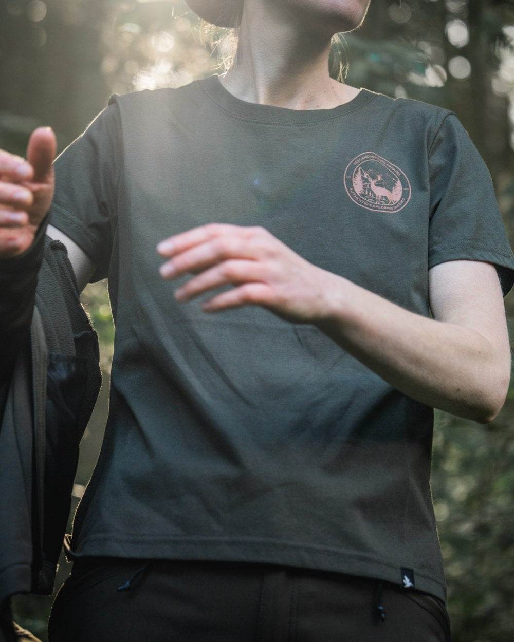 Pine Green Coloured Seeland Womens Hunting Heritage T-Shirt on forest background 