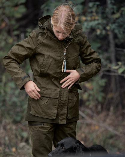 Pine Green Coloured Seeland Womens Key-Point Wax Jacket on outdoor background 