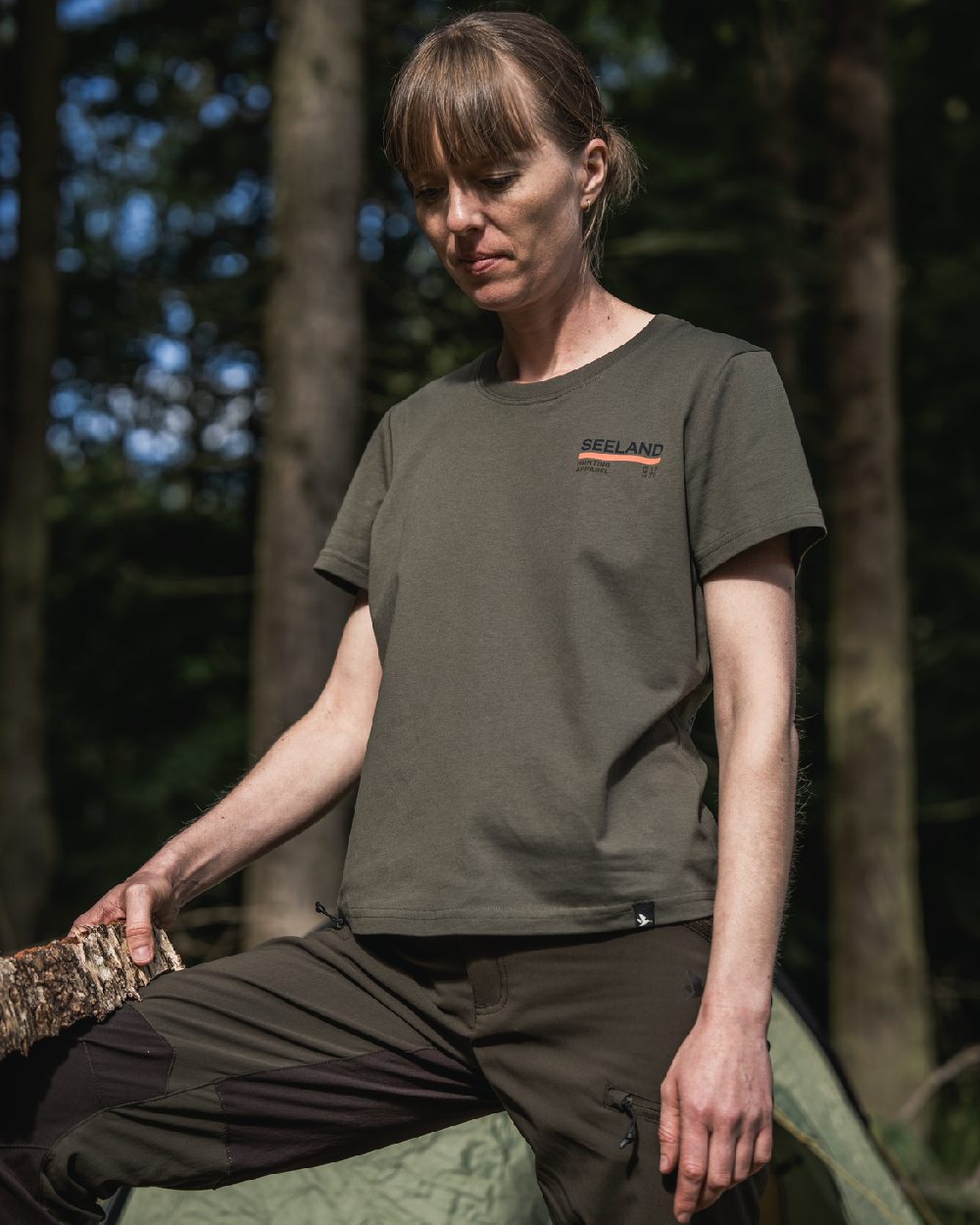 Grape Leaf Coloured Seeland Womens Leala T-Shirt on forest background 