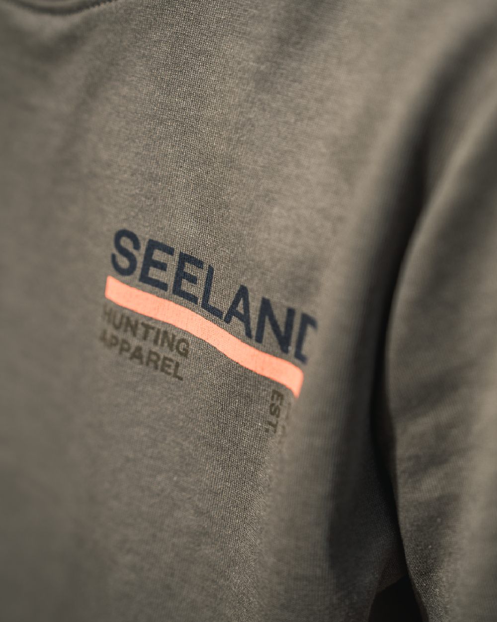Grape Leaf Coloured Seeland Womens Leala T-Shirt on blurry background 