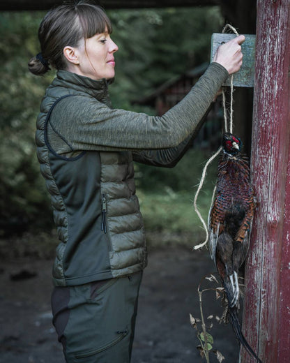 Military Olive Melange coloured Seeland Womens Peak Aia T-Shirt on forest background 