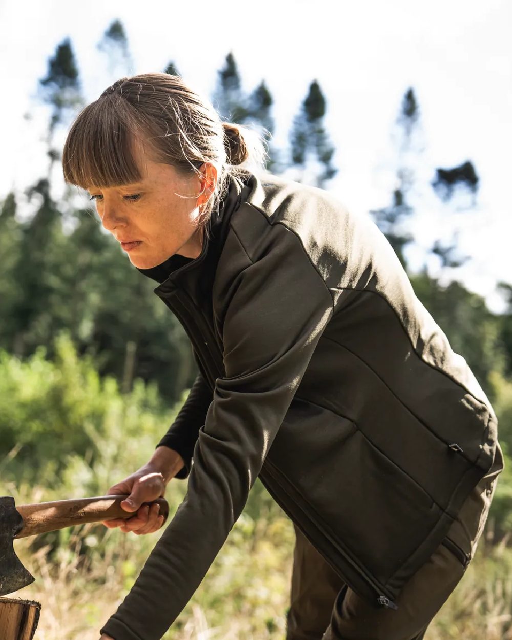 Pine Green Coloured Seeland Womens Tidal Tora Fleece Jacket on outdoor background 