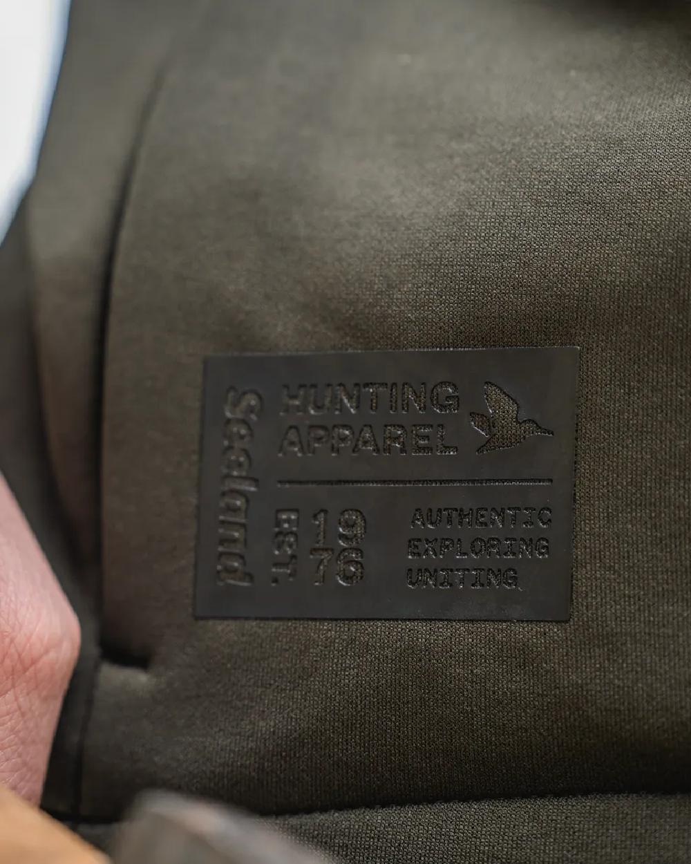 Pine Green Coloured Seeland Womens Tidal Tora Fleece Jacket on outdoor background 