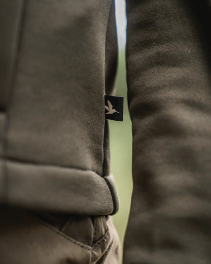 Pine Green Coloured Seeland Womens Tidal Tora Fleece Jacket on outdoor background 