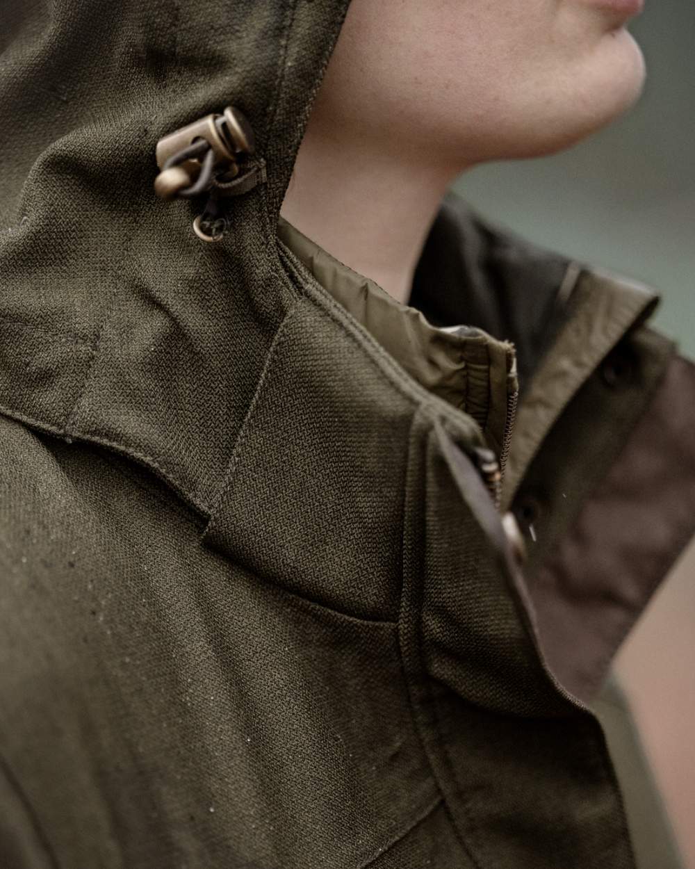 Shaded Olive coloured Seeland Womens Woodcock Royale Eve Jacket on forest background 