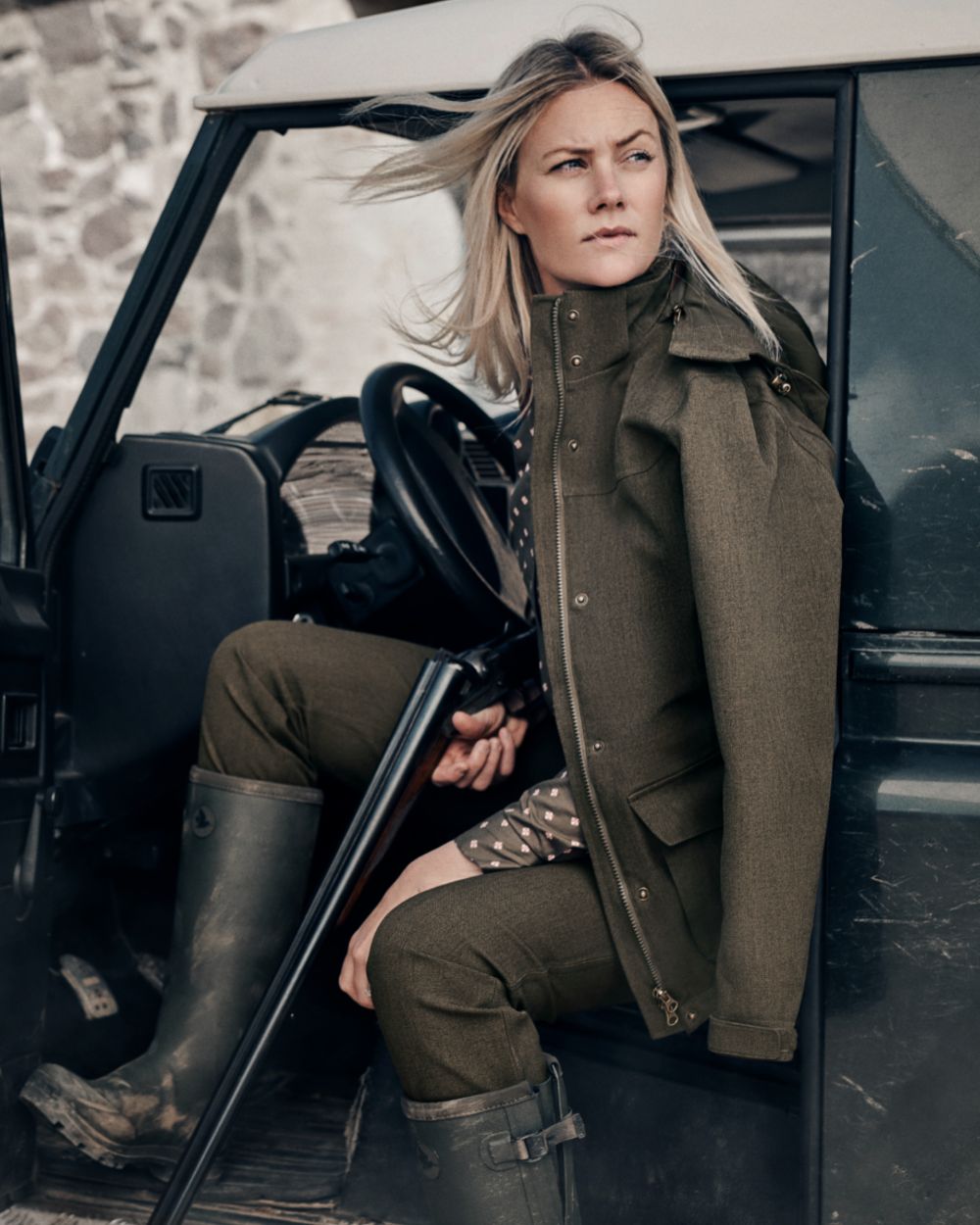 Shaded Olive coloured Seeland Woodcock Advanced Ladies Jacket on outdoor background 