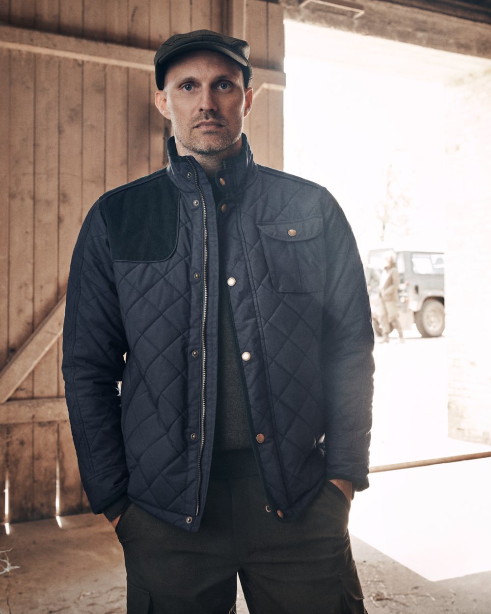 Classic Blue Coloured Seeland Woodcock Advanced Quilted Jacket on indoor background 