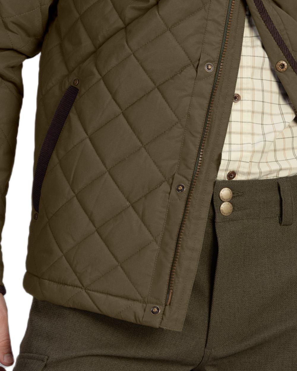Shaded Olive Coloured Seeland Woodcock Advanced Quilted Jacket on White background 