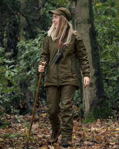 Pine Green Melange coloured Seeland Womens Avail Jacket on woodland background
