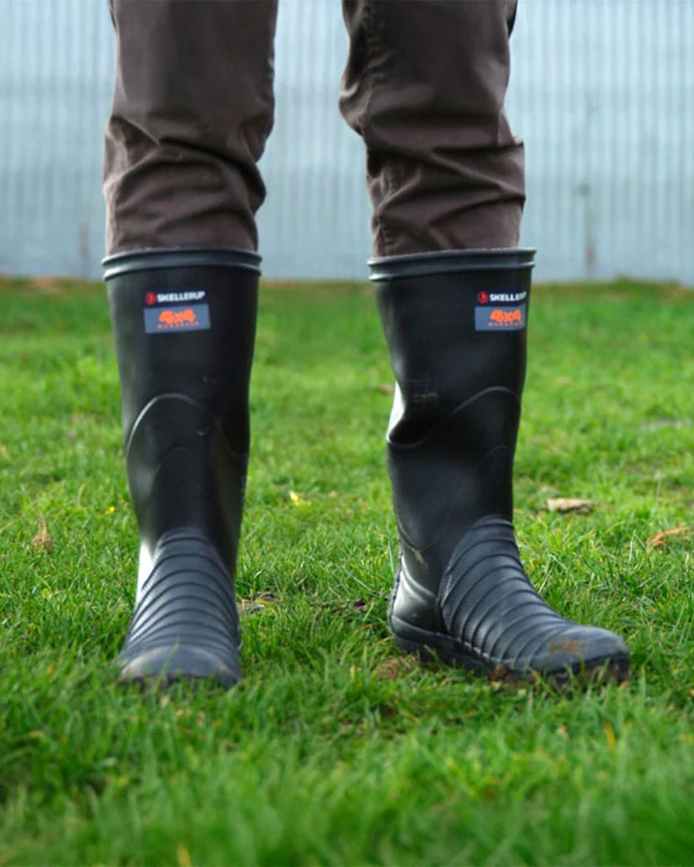 Black Coloured Skellerup 4x4 Marathon Wellingtons On A Outdoor Background 