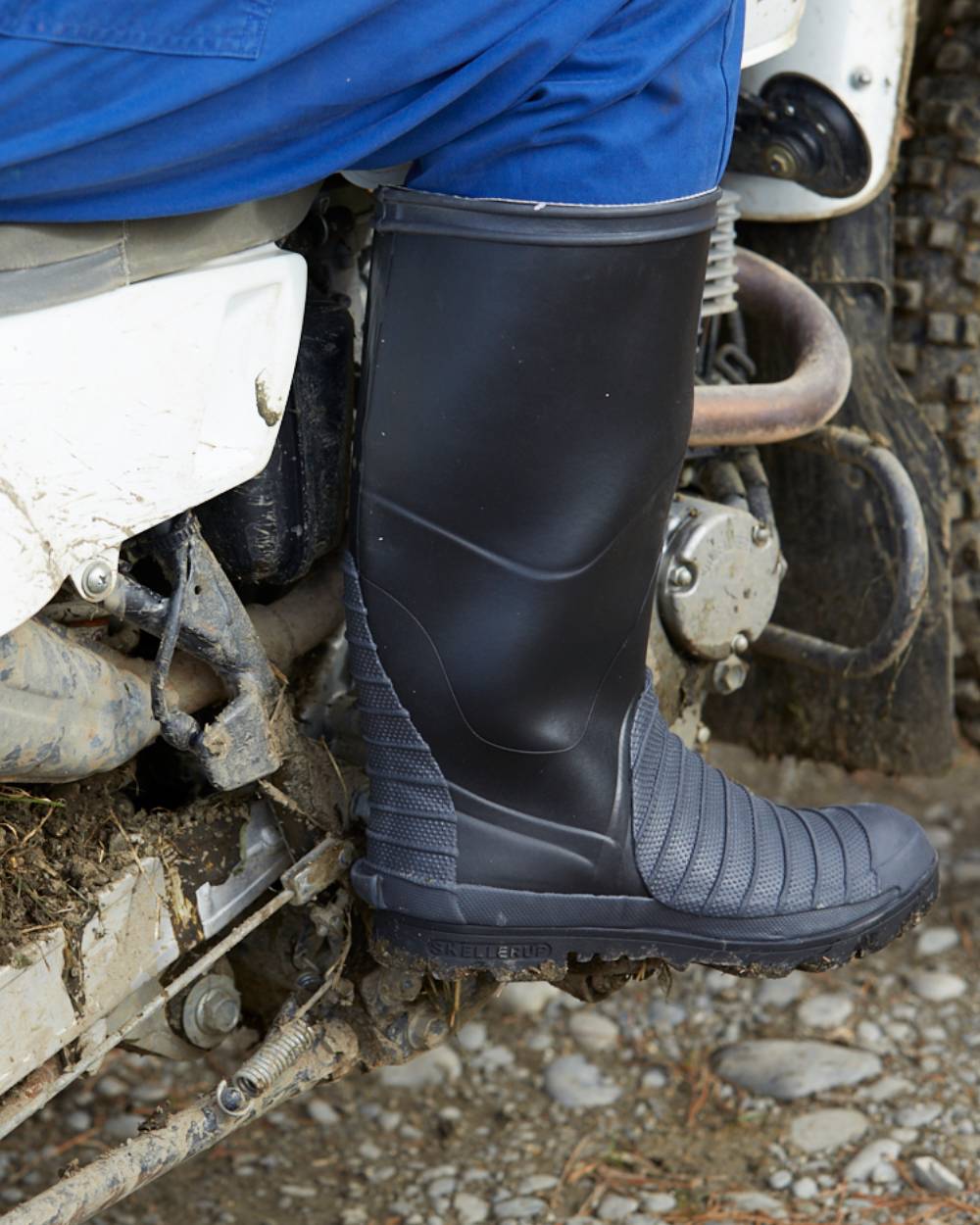 Black Coloured Skellerup 4x4 Marathon Wellingtons On A Outdoor Background 