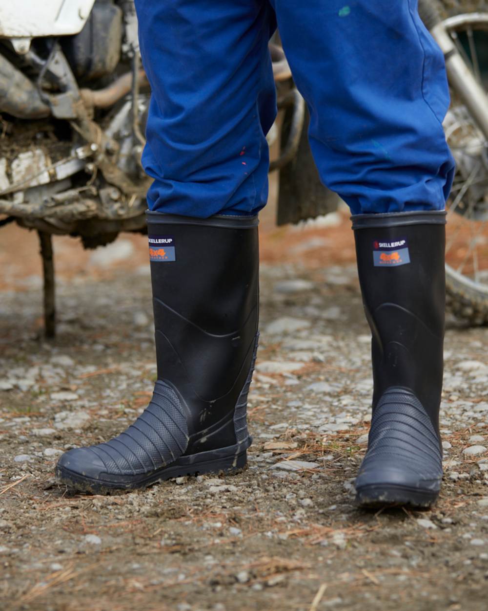 Black Coloured Skellerup 4x4 Marathon Wellingtons On A Outdoor Background 