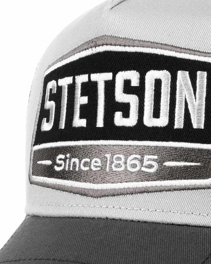 Grey Black coloured Stetson Black Highway Trucker Cap on white background 