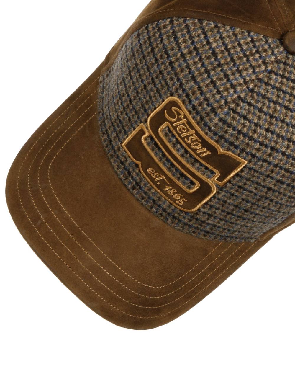 Brown coloured Stetson Capital S Trucker Cap on white background 