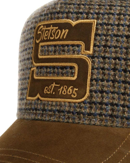Brown coloured Stetson Capital S Trucker Cap on white background 