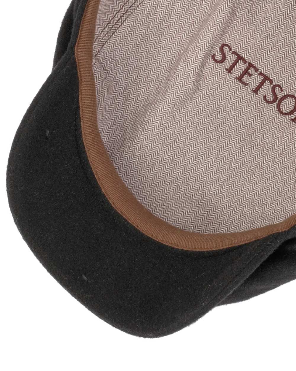 Black Coloured Stetson Cashmere Wool Driver Cap On A White Background 