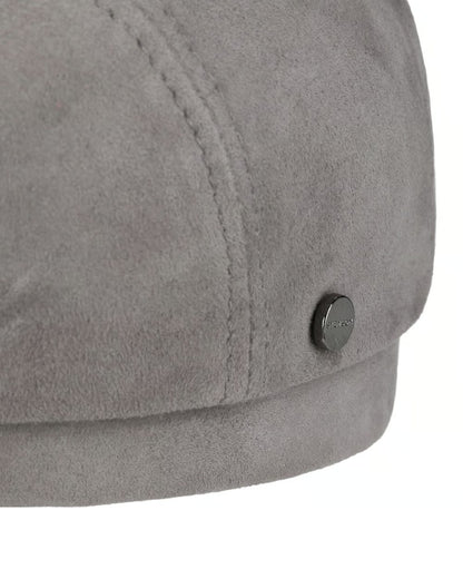Silver coloured Stetson Driver Goat Suede Cap on white background 