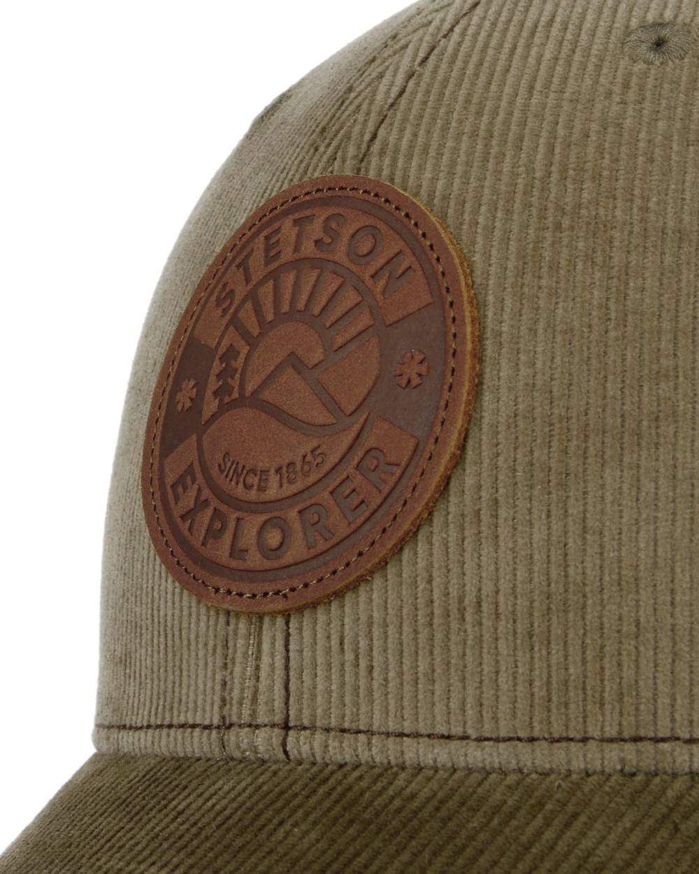 Light Green Khaki Stetson Explorer Since 1865 Trucker Cap on white background 
