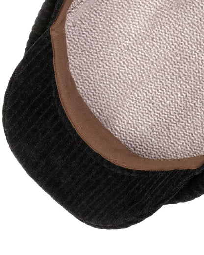 Black coloured Stetson Hatteras Corduroy Jersey Flat Cap on white background 