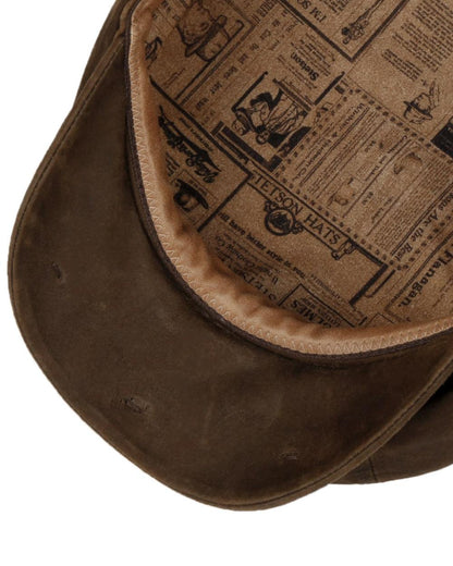 Mud coloured Stetson Hatteras Oily Goat Flat Cap on white background 