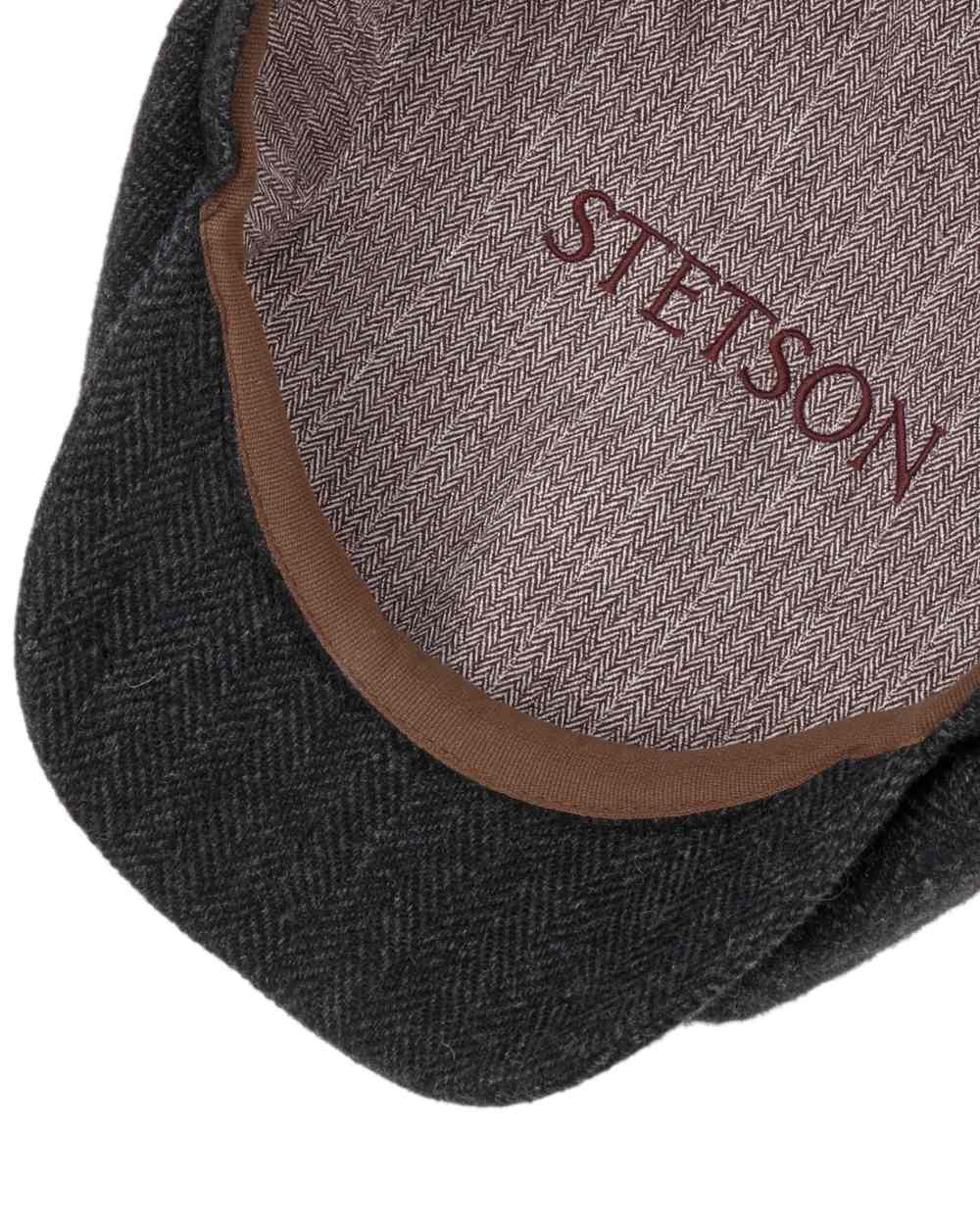 Dark Grey Coloured Stetson Hatteras Classic Wool Flat Cap On A White Background 