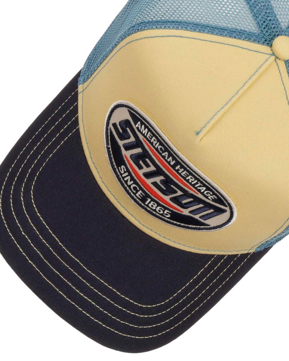 Midnight Blue Light Yellow coloured Stetson High Speed Trucker Cap on white background 