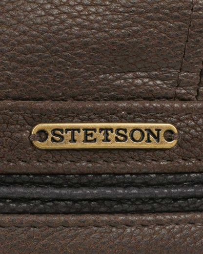 Brown Black coloured Stetson Redding Earflap Cap on white background 