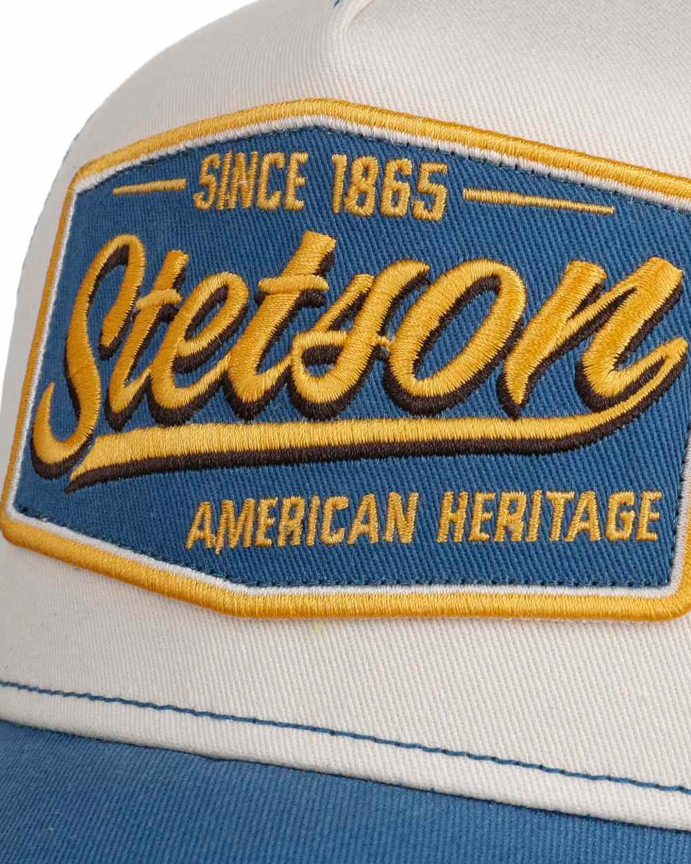Blue Off White coloured Stetson Since 1865 Vintage Trucker Cap on white background 