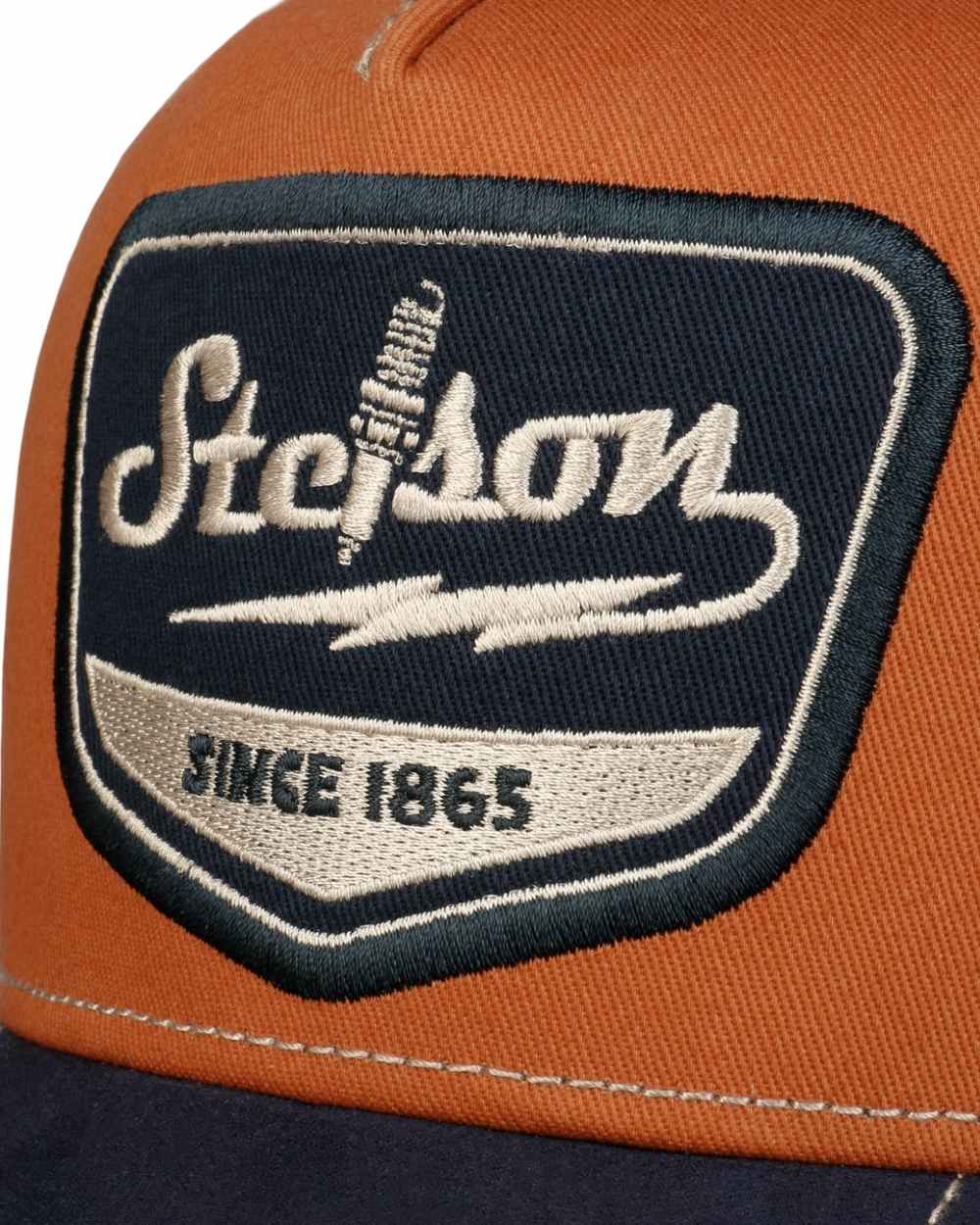 Navy coloured Stetson Spark Plug Trucker Cap on white background 