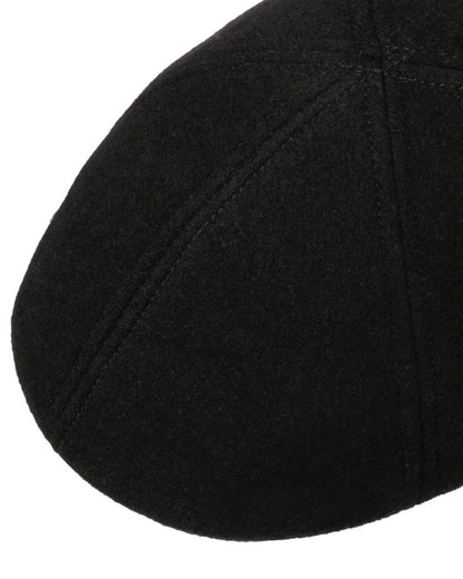 Black coloured Stetson Texas Wool Gatsby Cap on white background 