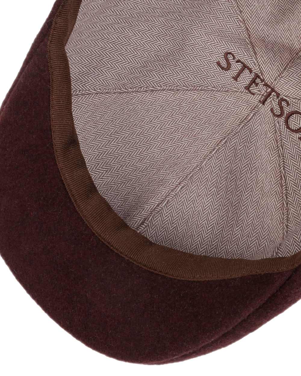 Burgundy coloured Stetson Texas Wool Gatsby Cap on white background 