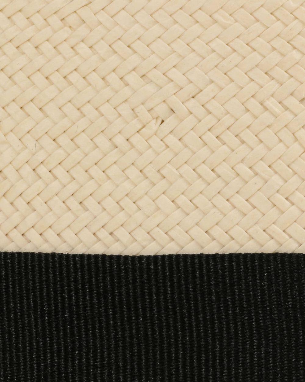 Bleached coloured Stetson Tokeen Toyo Traveller Straw Hat on white background 
