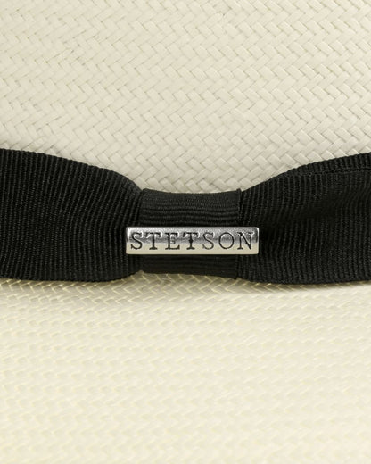 Bleached coloured Stetson Tokeen Toyo Traveller Straw Hat on white background 