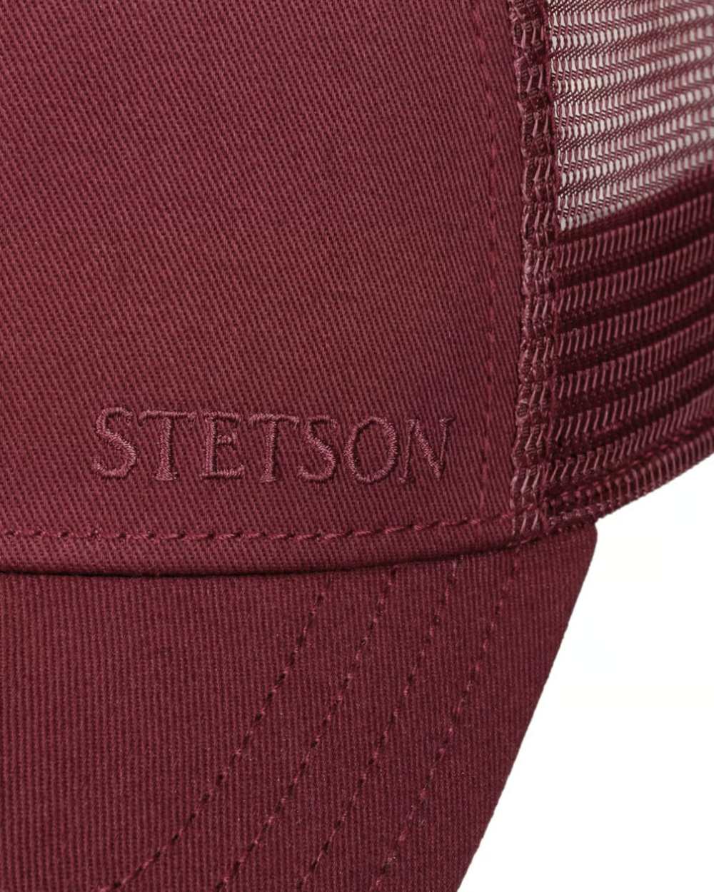 Red coloured Stetson Classic Cotton Trucker Cap on white background 
