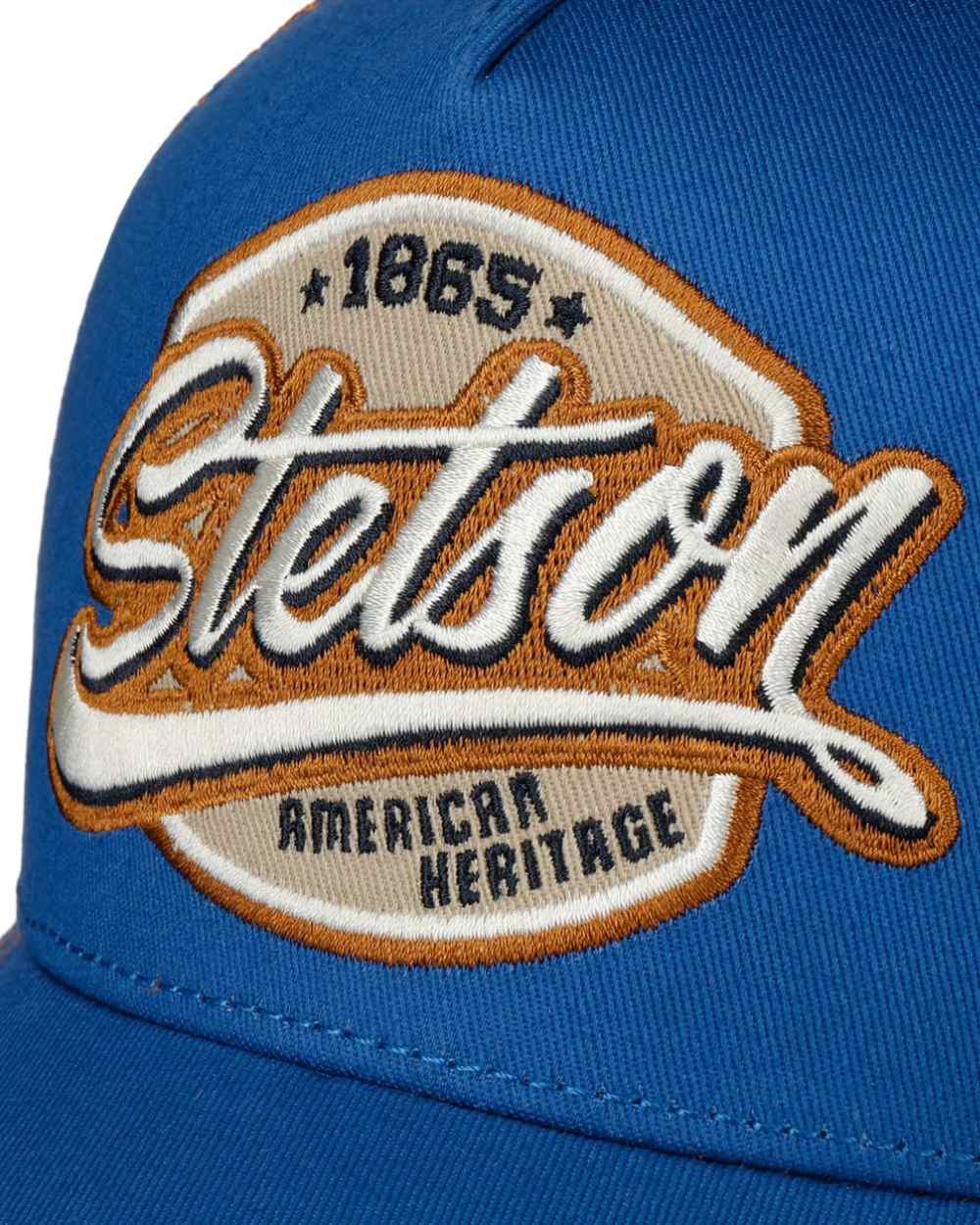 Royal Blue coloured Stetson Classic Patch Trucker Cap on white background 