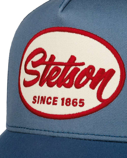 Blue coloured Stetson Engine Trucker Cap on white background 