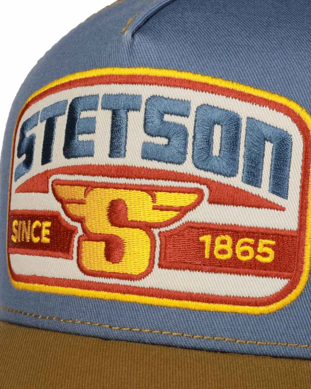 Brown Blue coloured Stetson S Wing Trucker Cap on white background 
