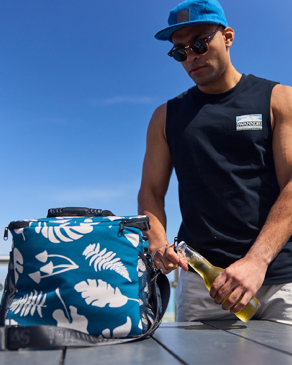 Black Coloured Swanndri Mens Lindis Printed Tank on outdoor background 