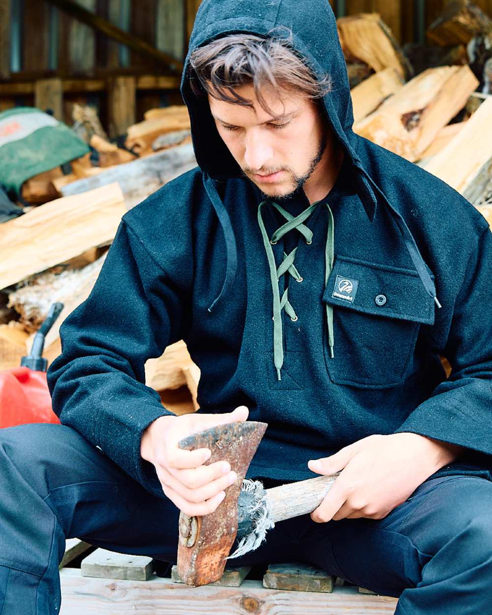 Black Coloured Swanndri Mens Original Wool Bushshirt With Lace-Up Front on outdoor background 