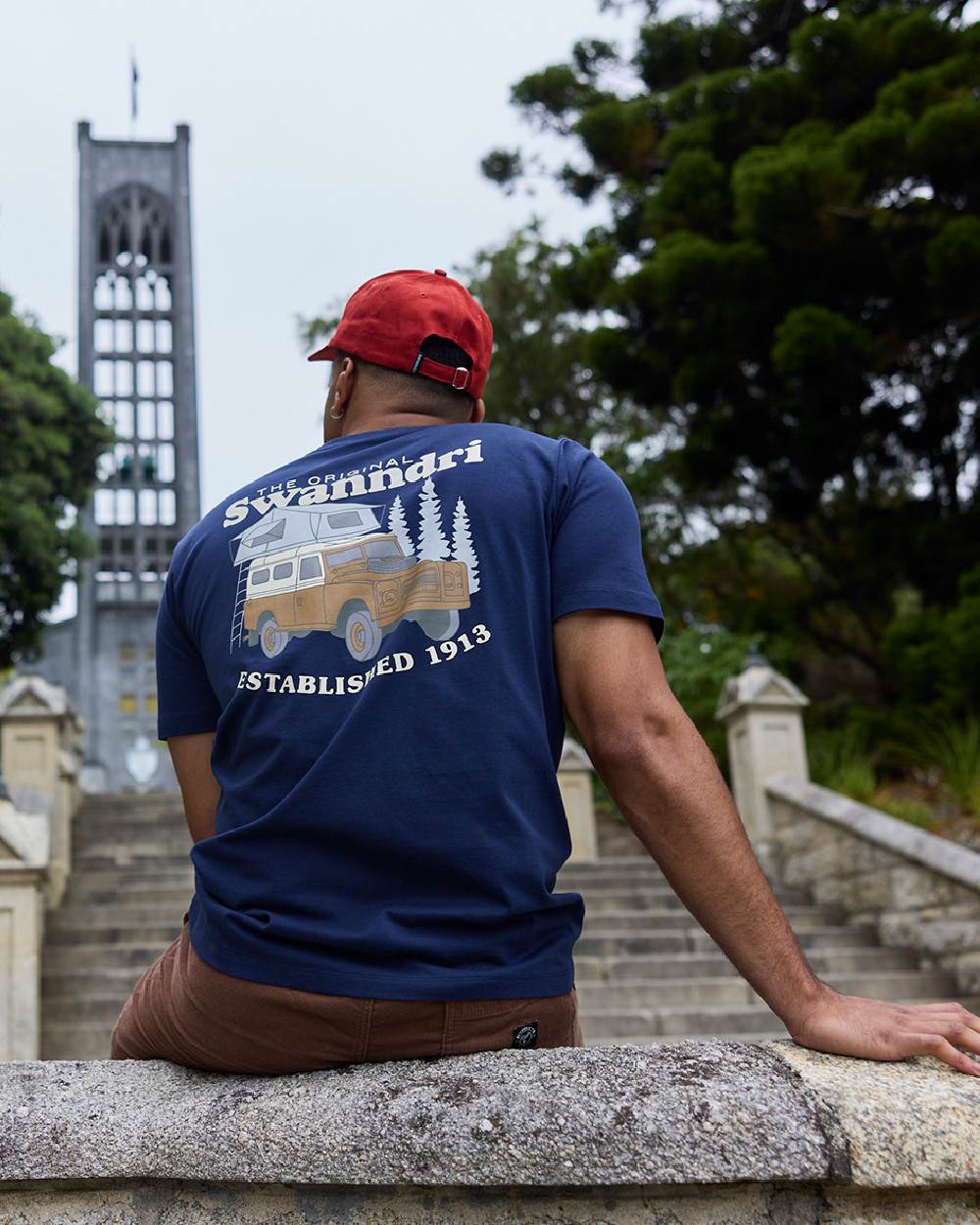 Navy Light Taupe Coloured Swanndri Mens Pop Top Printed T Shirt on outdoor background 