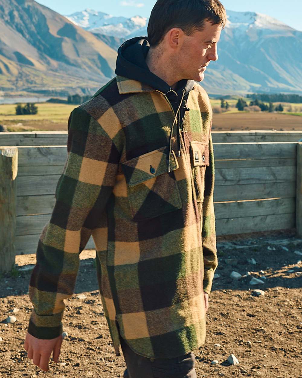 Checkamo Coloured Swanndri Mens Ranger Wool Zip Front Bushshirt on mountain background 