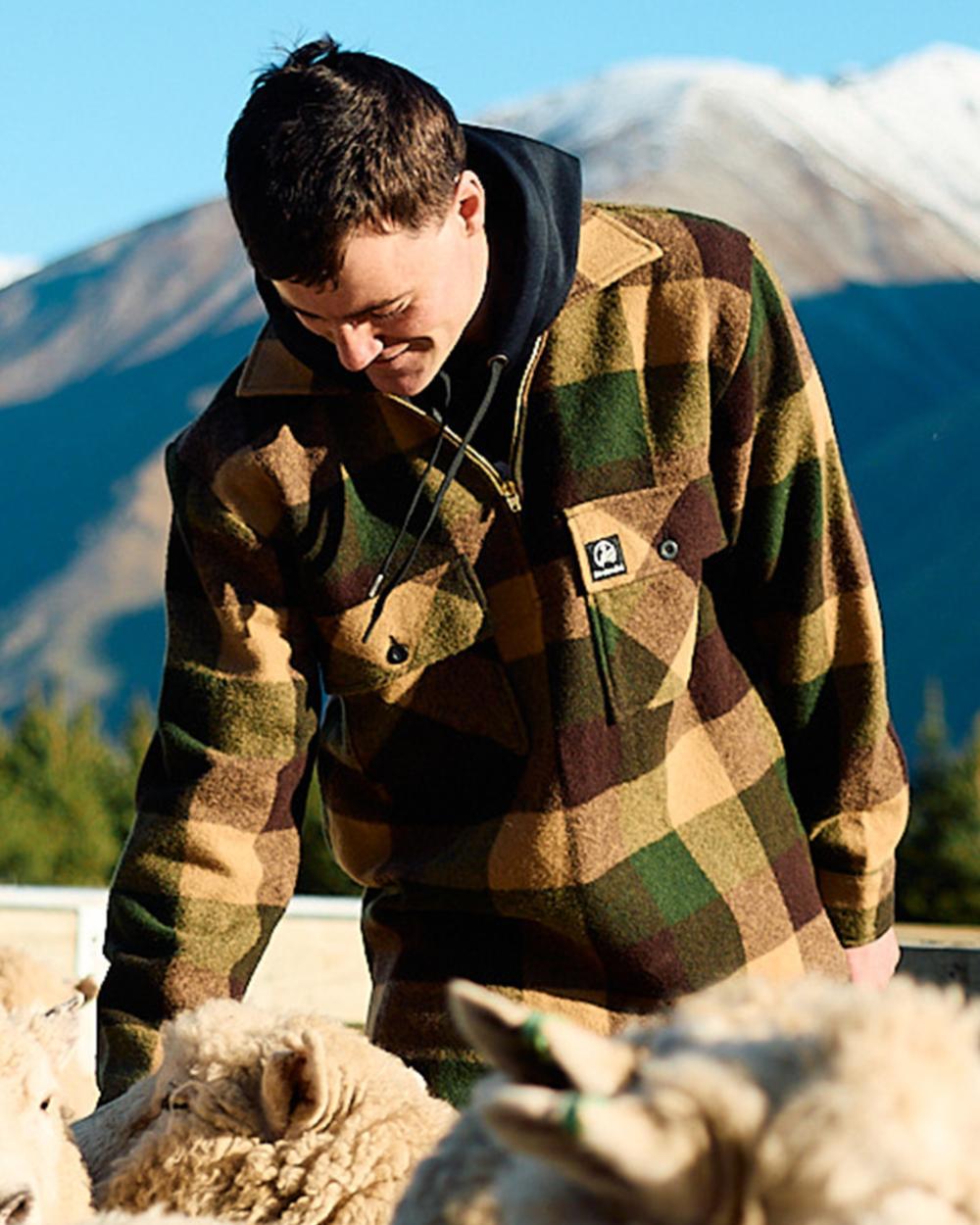 Checkamo Coloured Swanndri Mens Ranger Wool Zip Front Bushshirt on mountain background 