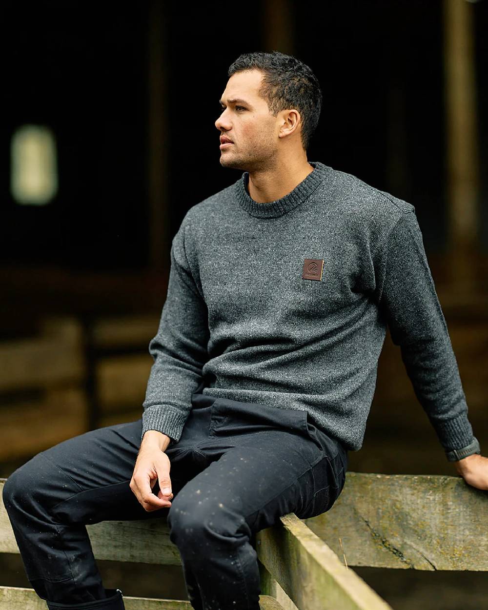 Charcoal Marle Coloured Swanndri Mens Seafarer Wool Crew Neck Jersey on blurry background 