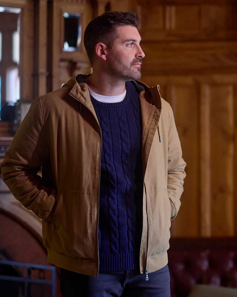Cashew coloured Swanndri Mens Whitlow V2 Canvas Hoodie on outdoor background 