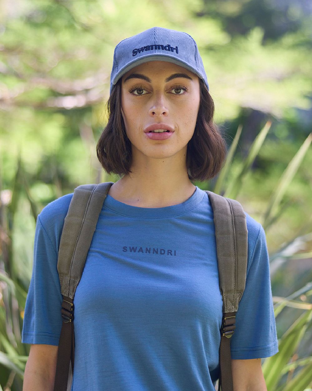 Smoke Blue Navy Coloured Swanndri Swanni Corduroy Cap on blurry background 