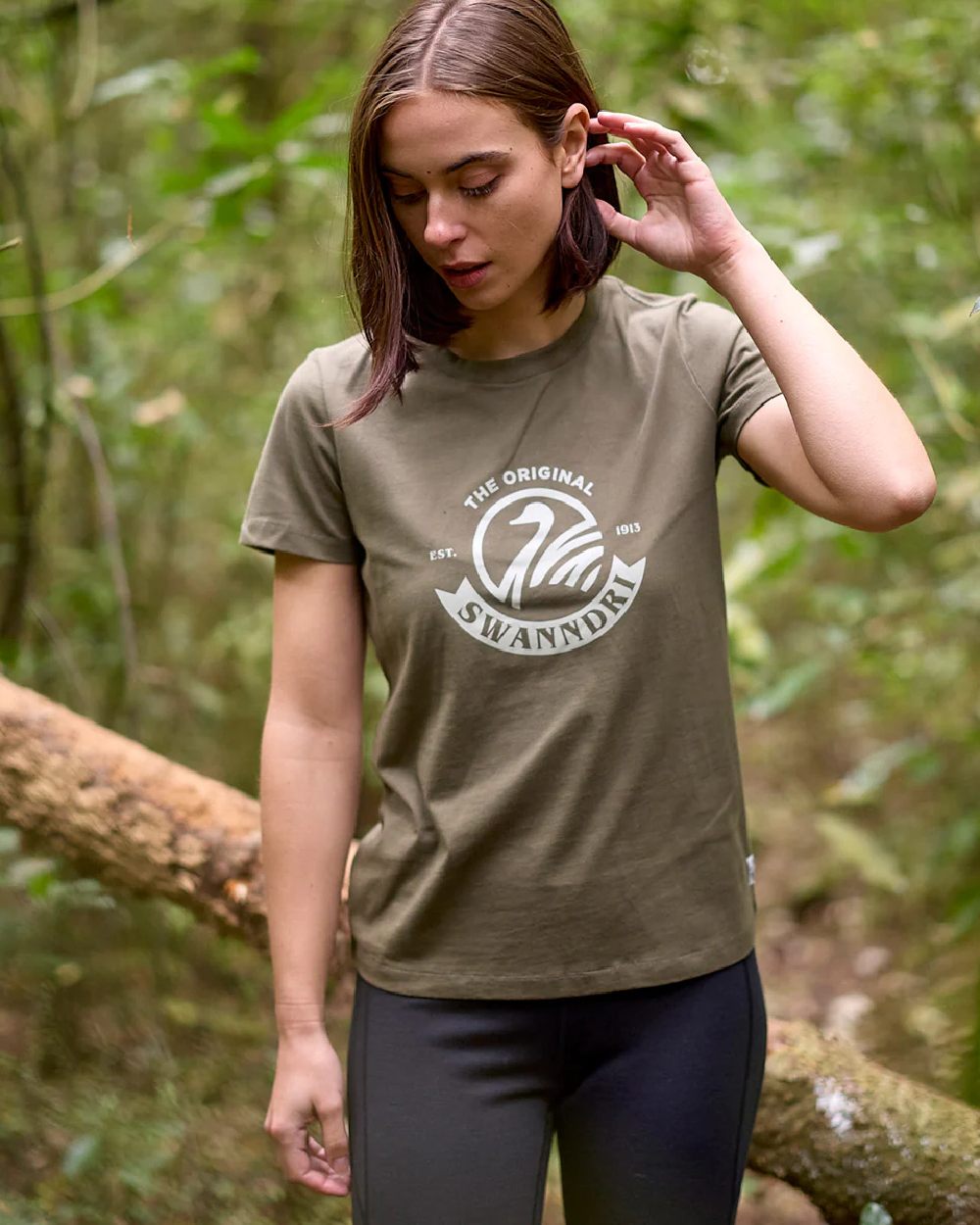 Dark Olive Horizon Grey Coloured Swanndri Womens Original V3 T-Shirt on forest background 