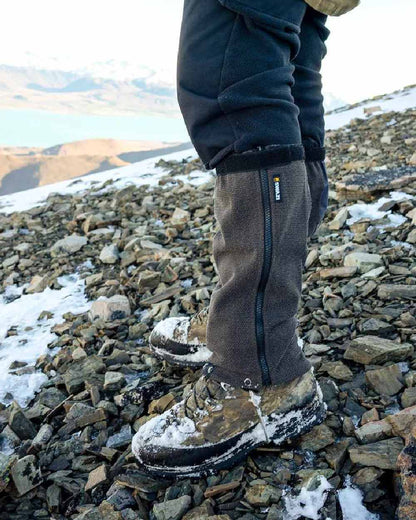 Black Coloured Swazi Ali-Gaiters on outdoor background 